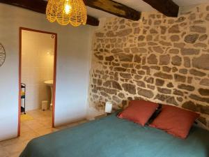 Ένα ή περισσότερα κρεβάτια σε δωμάτιο στο Maison de campagne, Au 40, Morvan, Bourgogne