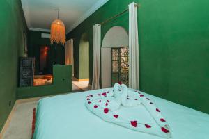 Postel nebo postele na pokoji v ubytování Hotel & Riad Veridis