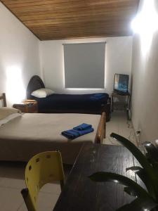 Voodi või voodid majutusasutuse Hostal Norma101 toas