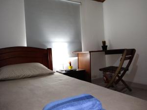 Voodi või voodid majutusasutuse Hostal Norma101 toas