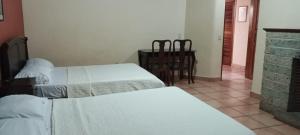 Letto o letti in una camera di Hotel Alsacia