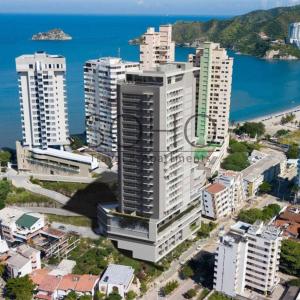 una vista aérea de una ciudad con edificios altos en Apartamentos Ambar Roca - Cerca al Mar by SOHO, en Santa Marta