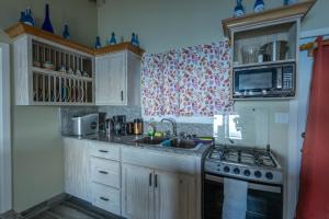 Dapur atau dapur kecil di The Ti-Kaye Oasis