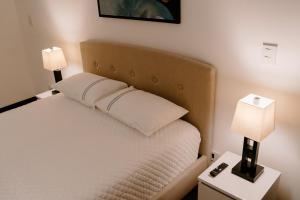 Giường trong phòng chung tại Apartamento exclusivo ciudad de Guatemala zona 10 +82 ảnh