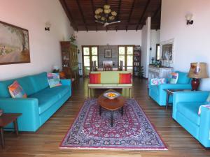 Posezení v ubytování Hapu Tales - Private Holiday Villa