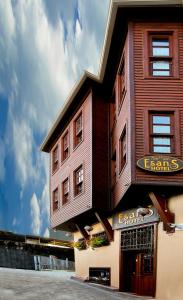 a building with a sign on the side of it at Esans Hotel - Special Category in Istanbul