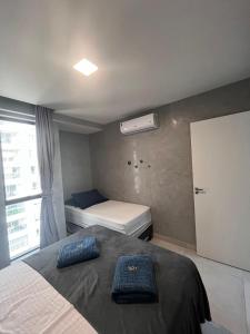 Ένα ή περισσότερα κρεβάτια σε δωμάτιο στο Flat Premium Quality CoHouse - Tambaú +37 φωτογραφίες