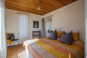 Postel nebo postele na pokoji v ubytování Ocean Cliff