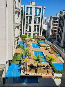 Swimmingpoolen hos eller tæt på Confortável Studio no Park Sul próximo ao aeroporto