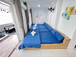 Postel nebo postele na pokoji v ubytování Hotel Đông Nhi