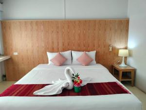 Postel nebo postele na pokoji v ubytování S2S Queen Trang Hotel