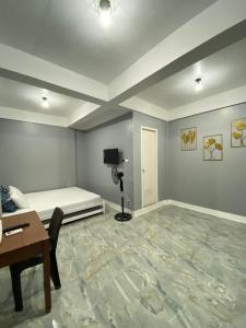 Postel nebo postele na pokoji v ubytování Maicaellas Transient Room