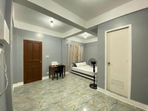 Postel nebo postele na pokoji v ubytování Maicaellas Transient Room