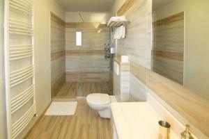 Vonios kambarys apgyvendinimo įstaigoje La Conacul Vesel