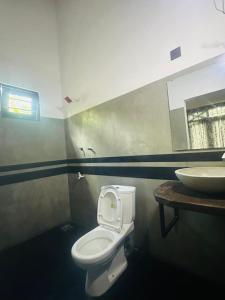 Een badkamer bij FENDI eco lodge