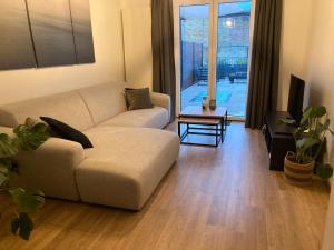 Posezení v ubytování EN PASSANT appartement