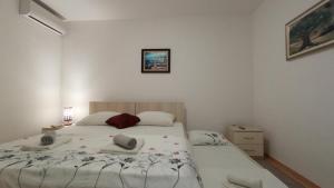 Katil atau katil-katil dalam bilik di Apartment Relax