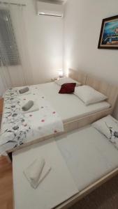 Katil atau katil-katil dalam bilik di Apartment Relax