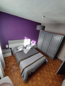 Postel nebo postele na pokoji v ubytování appartement indépendant avec vue panoramique