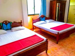 Postel nebo postele na pokoji v ubytování Geesh Residence : Rooms in Jaffna