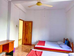 Postel nebo postele na pokoji v ubytování Geesh Residence : Rooms in Jaffna