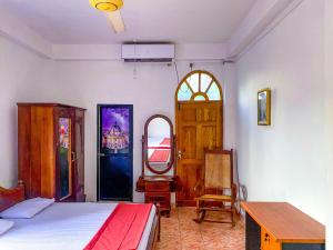 Postel nebo postele na pokoji v ubytování Geesh Residence : Rooms in Jaffna