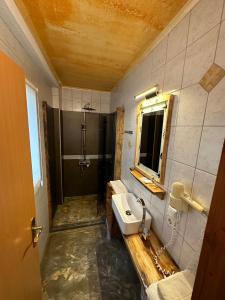 Vannituba majutusasutuses Gasthof zum Löwen