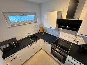 Η κουζίνα ή μικρή κουζίνα στο Hochwald Residence +20 φωτογραφίες