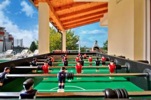 a group of lego men playing a game of pool at Exklusive 4-Sterne-Villa Mare - WLAN - Pool - Grill in Plovanija