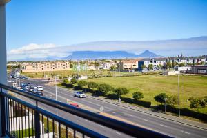 a view of a highway with cars on the road at 1d - Serene Retreat of Parklands in Cape Town