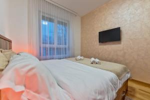 Krevet ili kreveti u jedinici u okviru objekta Royal Apartman