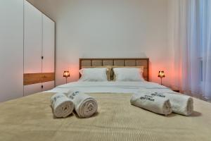 Krevet ili kreveti u jedinici u okviru objekta Royal Apartman