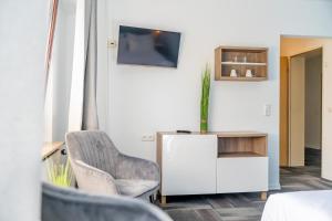 TV a/nebo společenská místnost v ubytování Hotel dat Norden