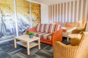 Posezení v ubytování Hotel dat Norden