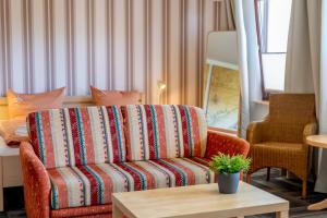 Posezení v ubytování Hotel dat Norden + 9 fotografií