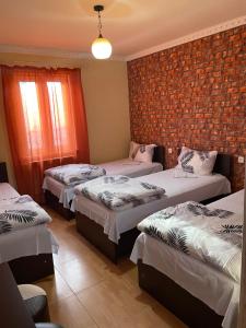 Voodi või voodid majutusasutuse Zangu Hotel toas
