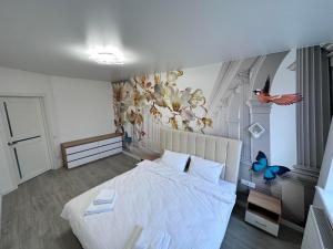 Posteľ alebo postele v izbe v ubytovaní ApartPlus Truskavets - Затишні апартаменти