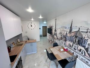 Kuchyňa alebo kuchynka v ubytovaní ApartPlus Truskavets - Затишні апартаменти