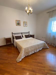 Tempat tidur dalam kamar di Isoletta 92100