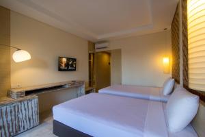 Voodi või voodid majutusasutuse M Suite Bali toas