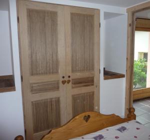 Postel nebo postele na pokoji v ubytování Appartement de la Fruitière