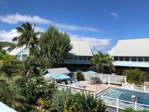 an aerial view of a resort with a swimming pool at 12 Sealofts On The Beach - Frigate Bay in Frigate Bay