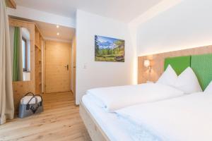 Cama o camas de una habitación en Landhaus Sunseitn