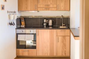 Una cocina o zona de cocina en Landhaus Sunseitn
