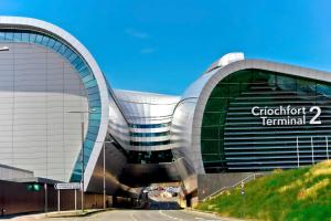 a building with a sign on the side of it at Modern 2Bedroom Oasis near Dublin city centre & Airport in Dublin