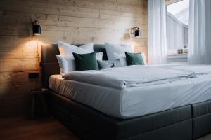 Katil atau katil-katil dalam bilik di Die Karwendelsuite - die 5-Sterne FeWo