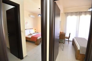 Posteľ alebo postele v izbe v ubytovaní Dionysus seaside villa