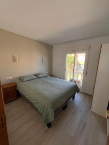 Een bed of bedden in een kamer bij Casa Verde