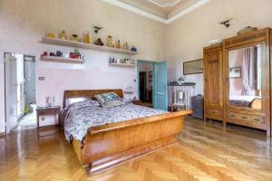 Un pat sau paturi într-o cameră la Villa La Cingallegra