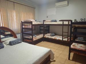 Postel nebo postele na pokoji v ubytování Pousada Hotel Santa Helena